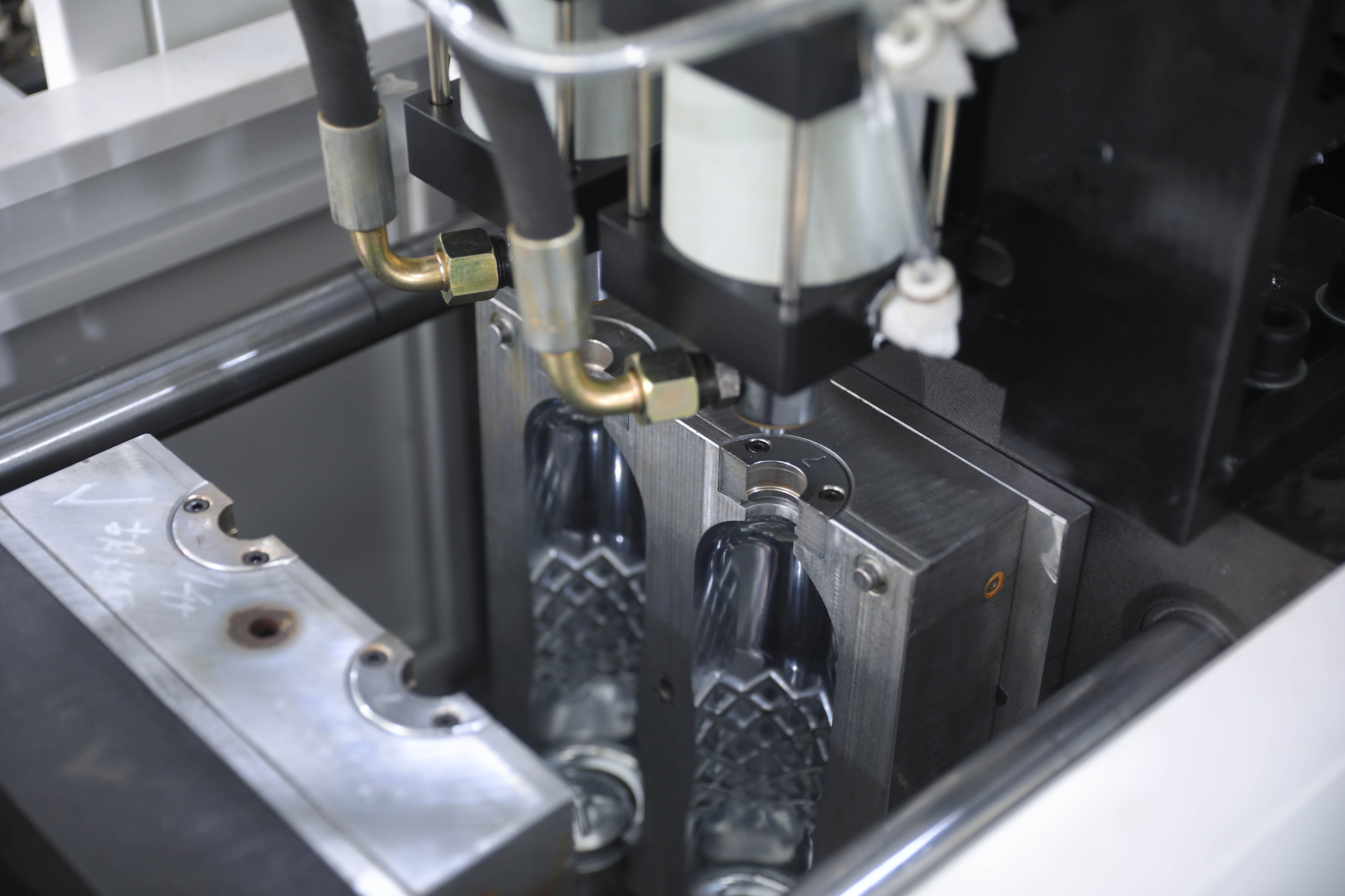 Semi Automatic PET Blowing Machine Low Cost 2L 5L 10L Water Bottle Production Line from China supplier